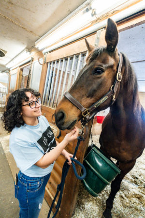 Manor College vet student with horse