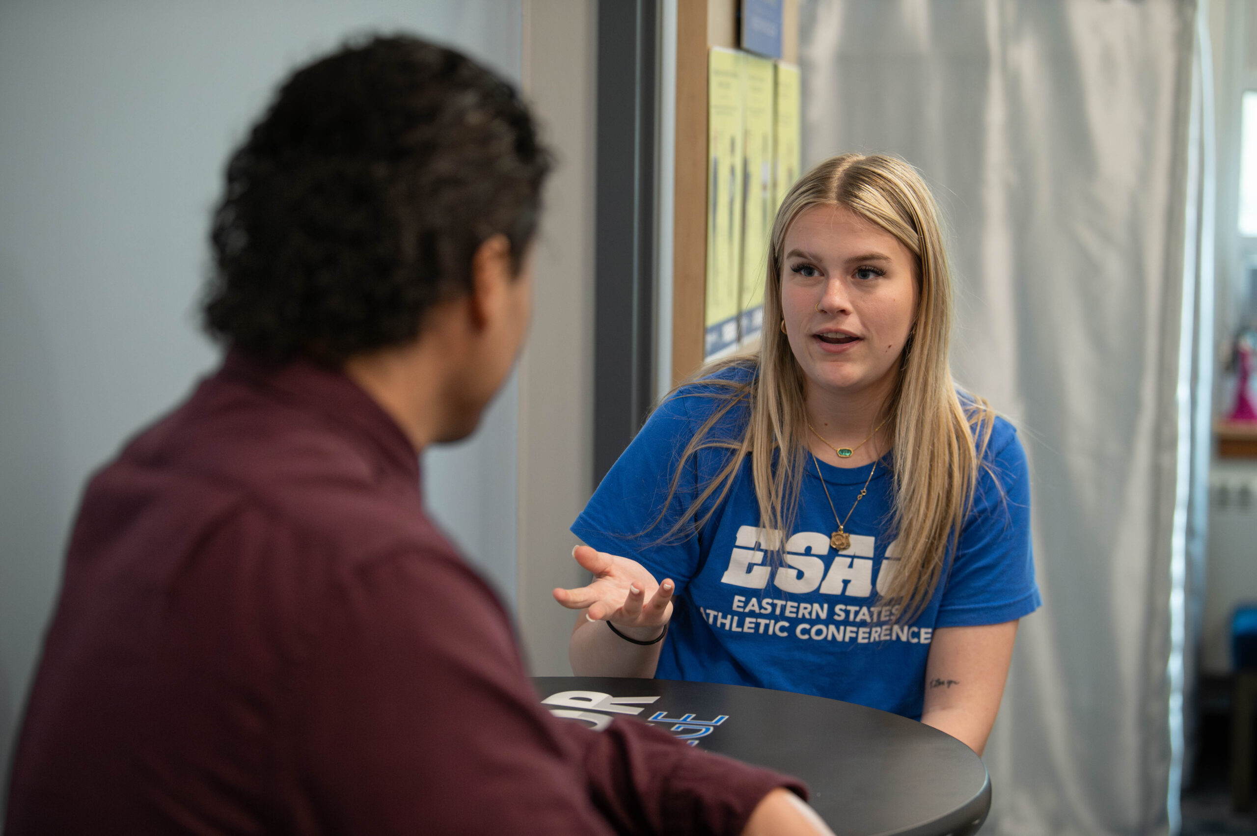 Student talking to the Career Center Director