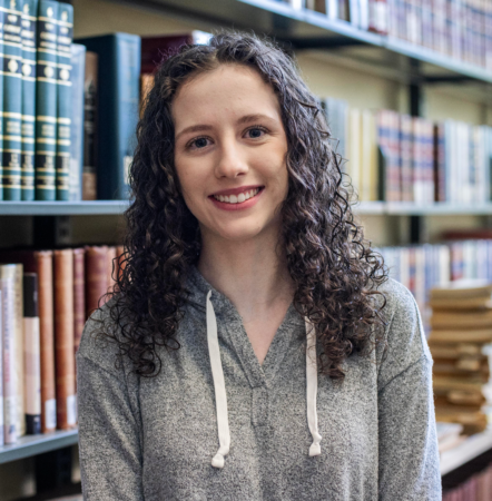 Manor Public Policy student in the library